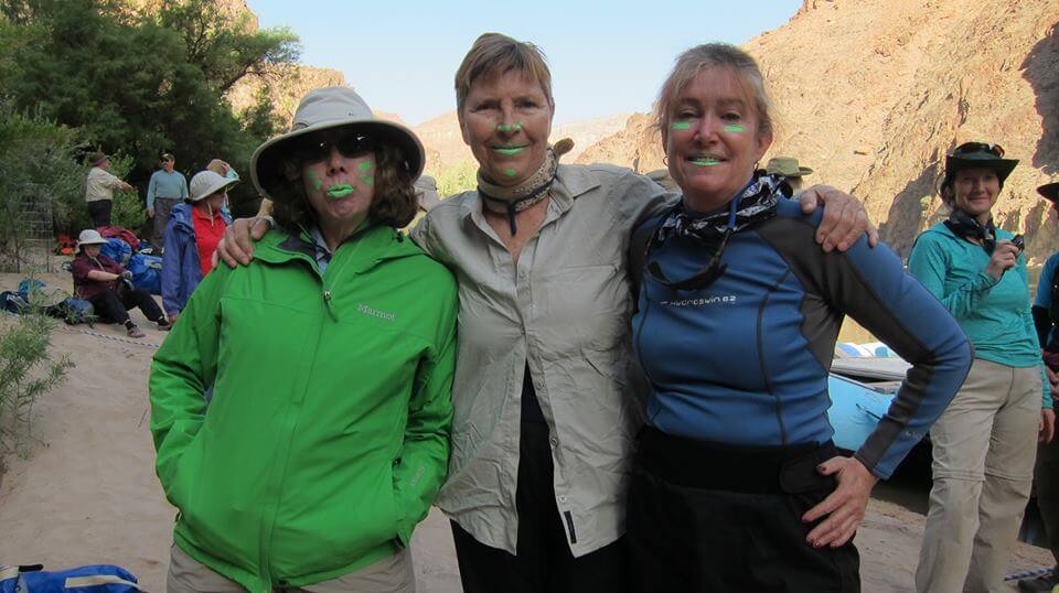 Passengers often enjoy painting their faces and adding some color on Colorado River trips. 