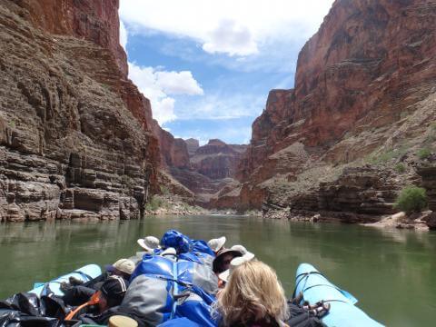 guests enjoying the beauty of the grand canyon on a river rafting trip
