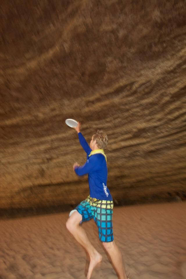 Playing Frisbee in Red Wall Cavern on a Grand Canyon Raft Trip