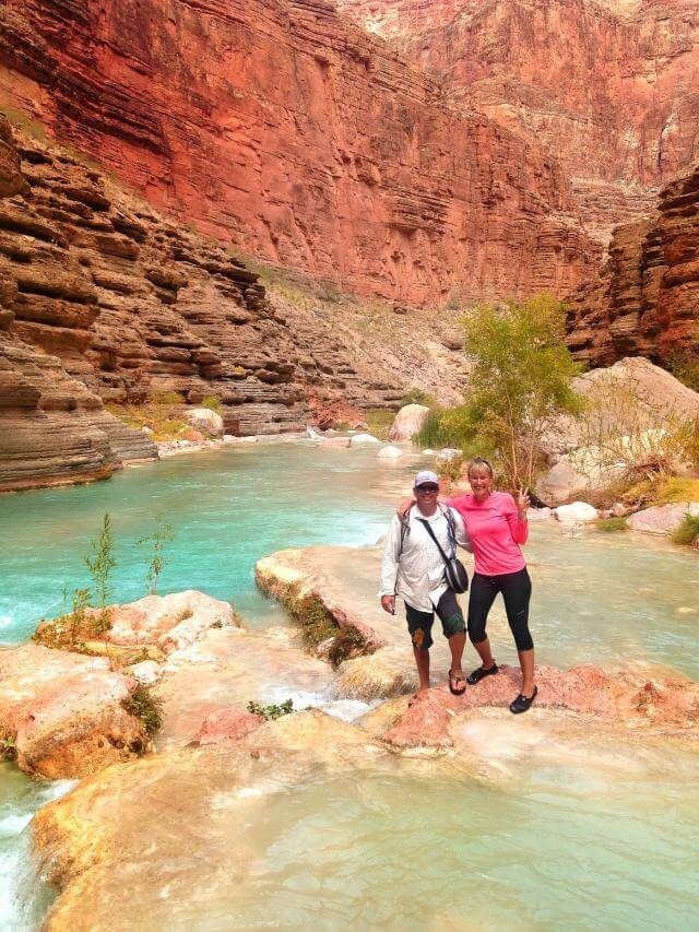 Grand Canyon raft guide, Brock, and passenger enjoy Havasu Creek.