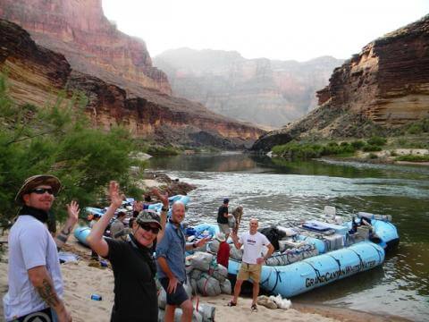 Grand Canyon Whitewater passengers load their rafts.