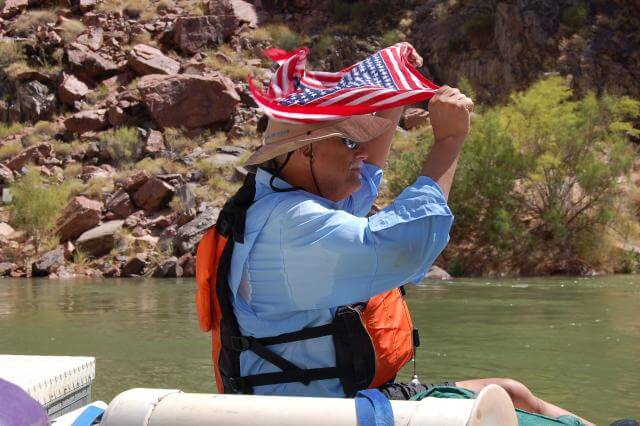 Grand Canyon Whitewater Passenger Boasts His Patriotism On A Rafting Trip.