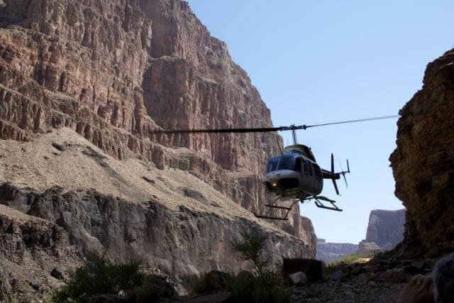Grand Canyon Whitewater passengers helicopter out at Whitmore Wash