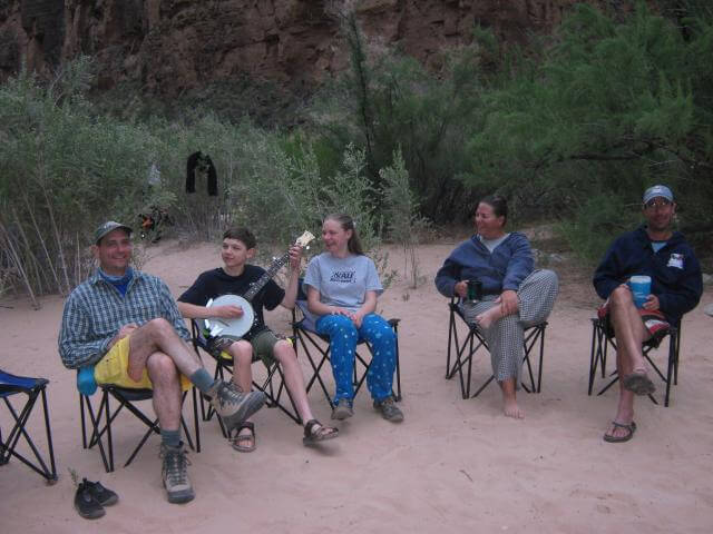 Grand Canyon Whitewater Guests Enjoying Leisure Time in Camp.