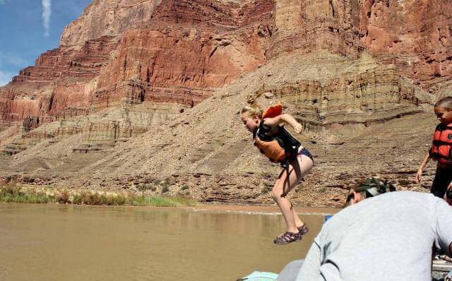 Even though the Colorado River in Grand Canyon is cold, kids still enjoy taking the plunge.
