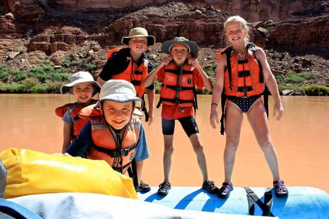 Kids on a Grand Canyon Whitewater river trip love spending time on the rafts.