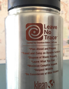 The back shows the Leave No Trace ethics.