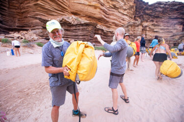 Carrying dry bags to the raft