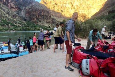 Loading bags onto raft