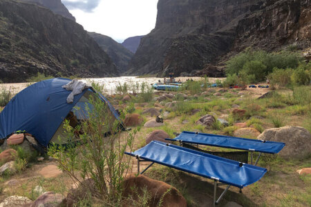 River trip cots and a tent