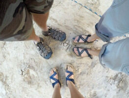 People wearing river sandals