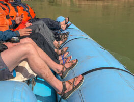 People wearing river sandals